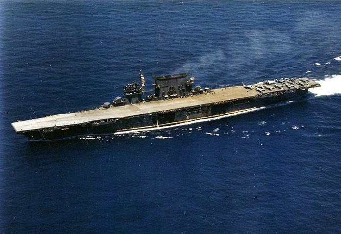 The USS Saratoga CV-3 aircraft carrier makes her way across the sea in 1942