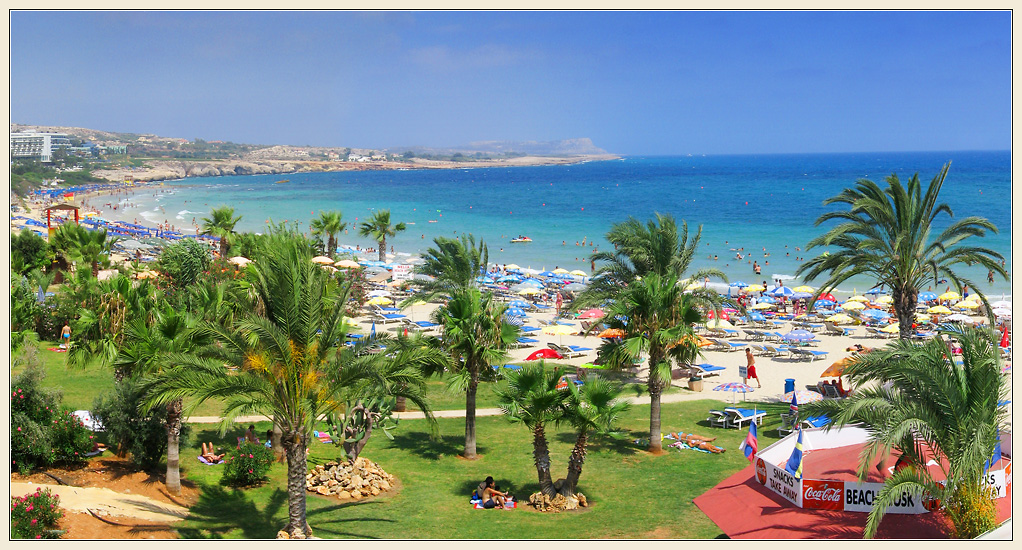 Panoramic view of Agia Napa Beach in Cyprus with tons of beach goers and water enthusiasts