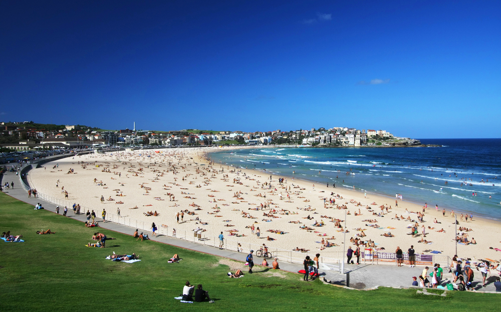 Pristine white sands and clear blue waters characterize Bondi Beach in Sydney, Australia making it a popular spot among locals and tourists alike.
