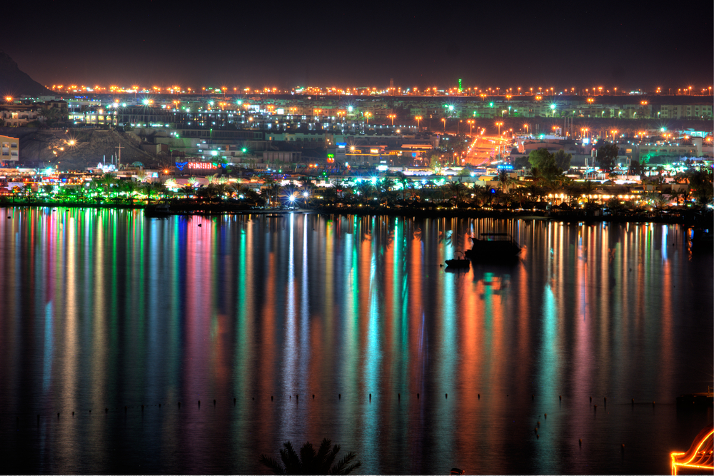 Bright lights glistening over Naama Bay, Sharm al Sheikh, Egypt at night.
