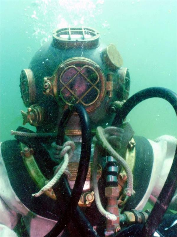 Male diver enjoys the hardhat diving experience provided by Northeast Diving Equipment Group