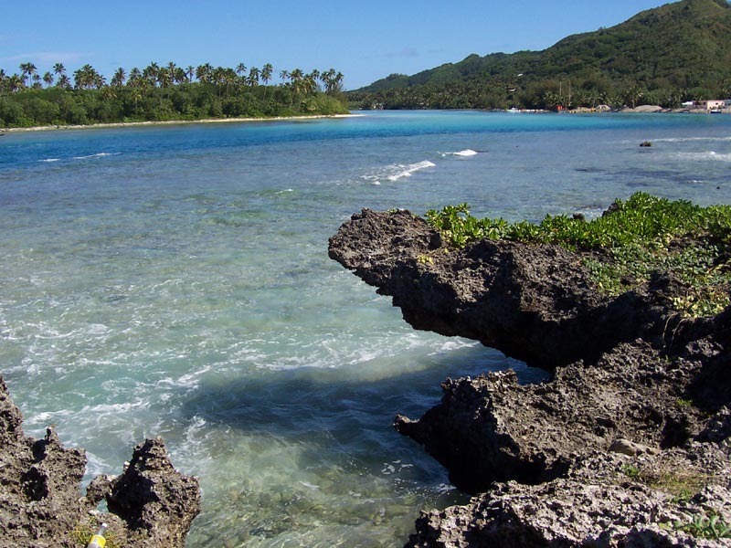 The clear blue waters wash up upon the beach at Rarotonga on the Cook Islands where a large portion of marine life is soon to be protected
