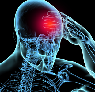 Man grabs his head after a head trama, not realizing he has a concussion