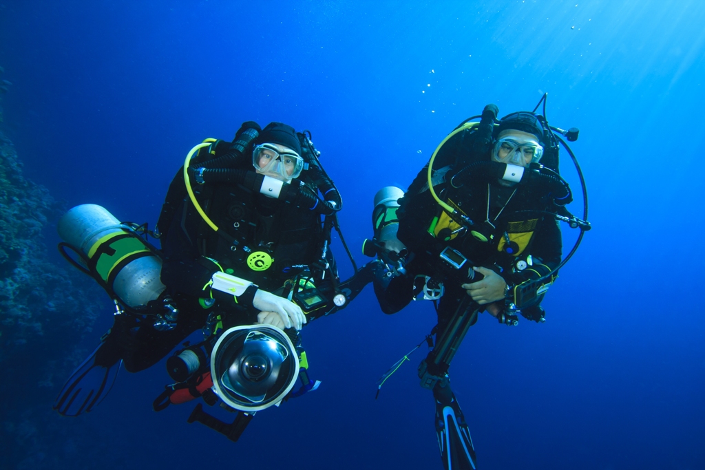 Two rebreather divers enjoy a safe, relaxing dive in the Caribbean