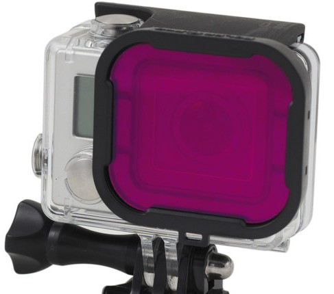 Brigth magenta filter attached to an popular underwater camera and housing