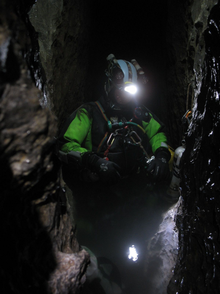 Cave diver brings along multiple dive lights to ensure that he has adequate light on his dive