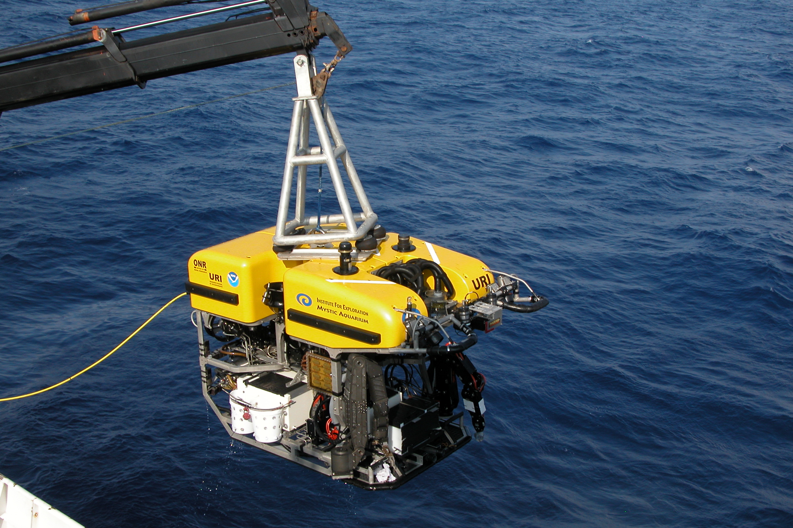 Remotely operated vehicle or ROV is being lowered into the sea in an effort to find new shipwrecks