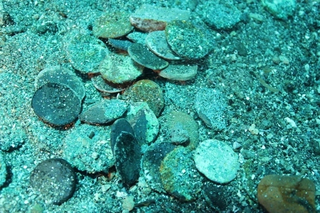 Ancient bronze coins recovered by Italian archaeologists 