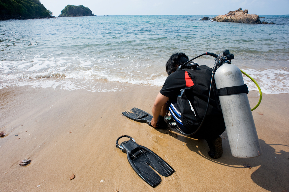 A smart shore diver uses tide tables to help ensure that his dive is a safe and enjoyable one