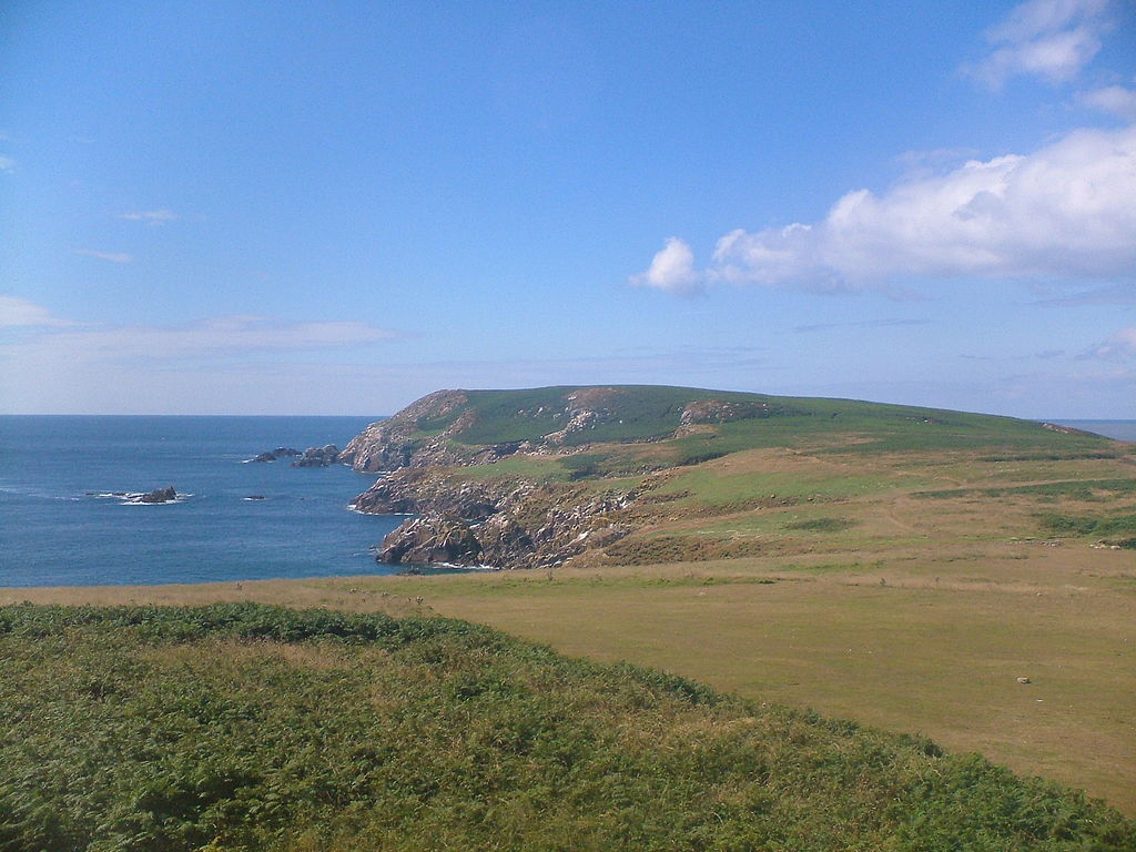 Picturesque view of Ireland's Great Saltee Island with waves hitting the rocks along the shoreline