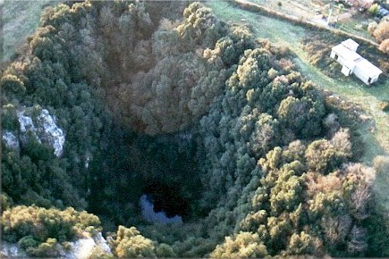Aerial view of Rome's Pozzo Del Merro cave; the world's deepest flooded karstic cavity