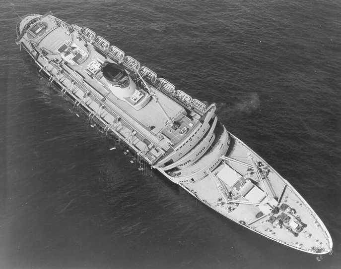 The Andrea Doria luxury liner sinking after being struck by the MS Stockholm off the coast of Nantucket, Massachussets