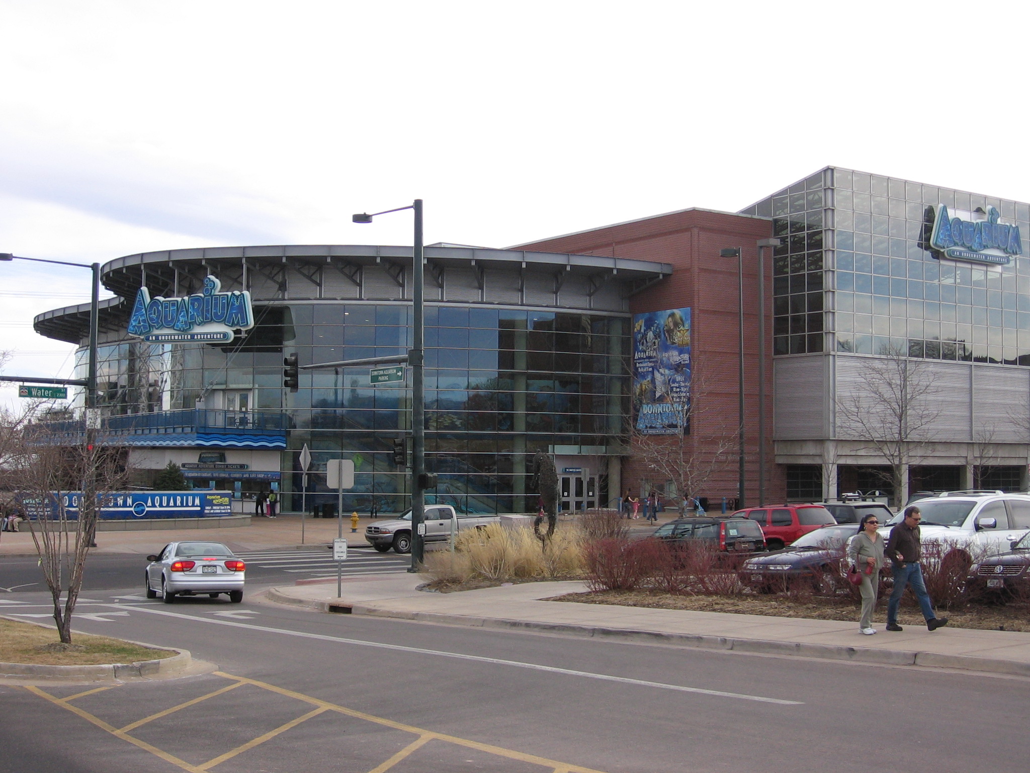 Exterior view of the Denver Downtown Aquarium from the parking lot in Denver, Colorado