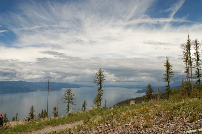 Picturesque view of Flathead Lake in Montana with cloud filled skies