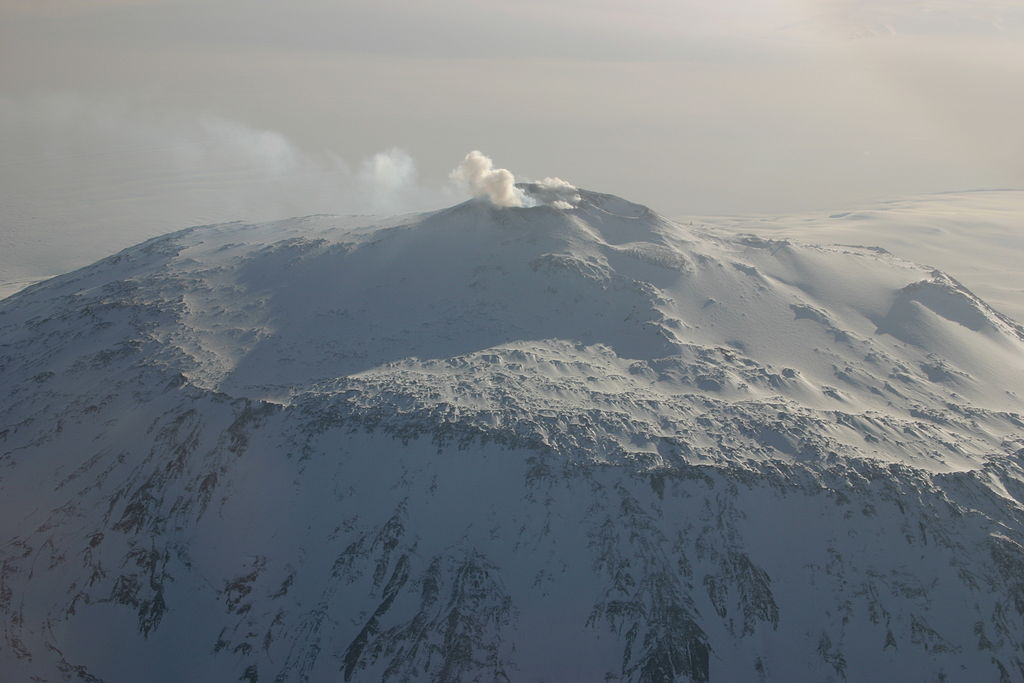 Aerial view of the active volcano, Mount Erebus, in Antarctica's Ross Sea which is often visited and climbed by tourists that visit the area in the summer months