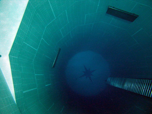 Aerial view of a deep pit in Belgium's Nemo 33, the largest swimming pool in the world, by John Beernaerts