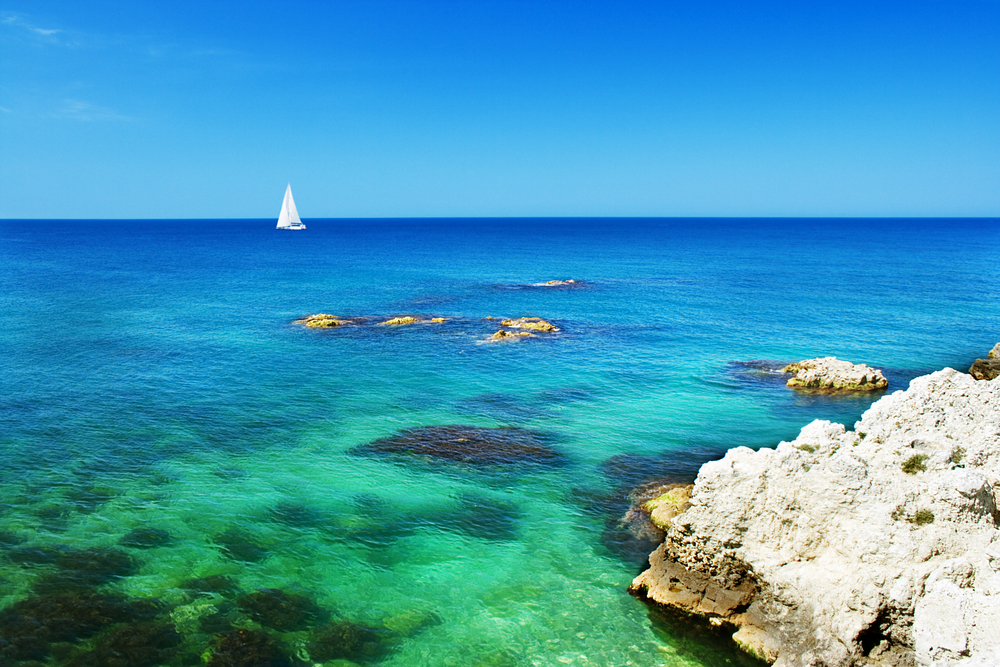 sailboat in the atlantic ocean searches for the lost civilization of Atlantis