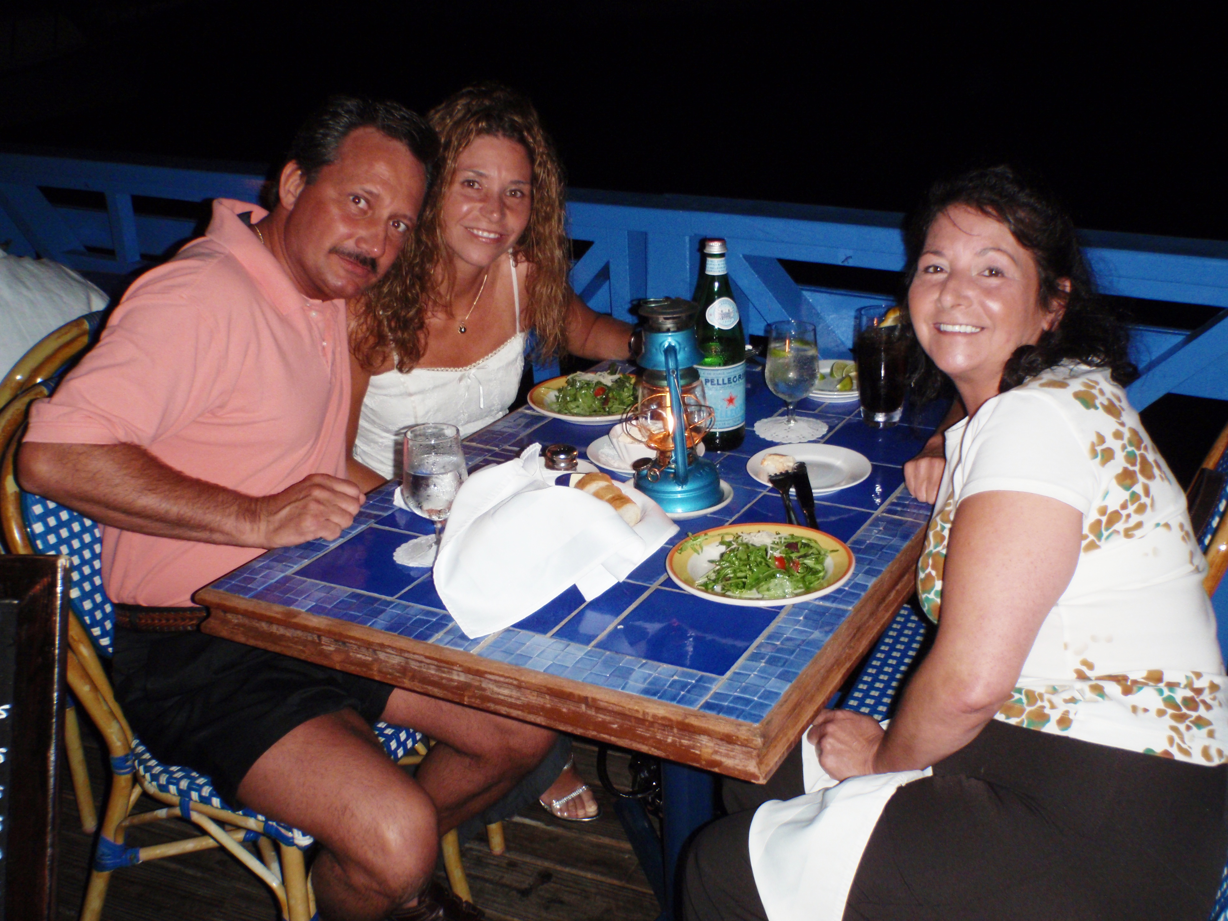 dinner with friends and family at an oceanfront restaurant in Aruba
