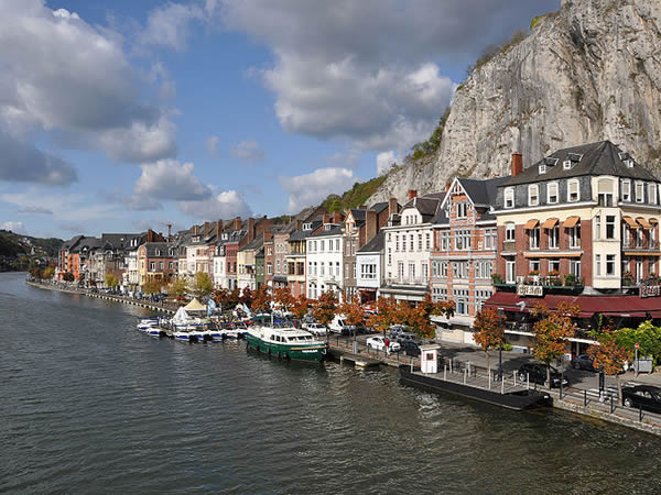Picturesque view of the Meuse along the water in Diant, Belgium