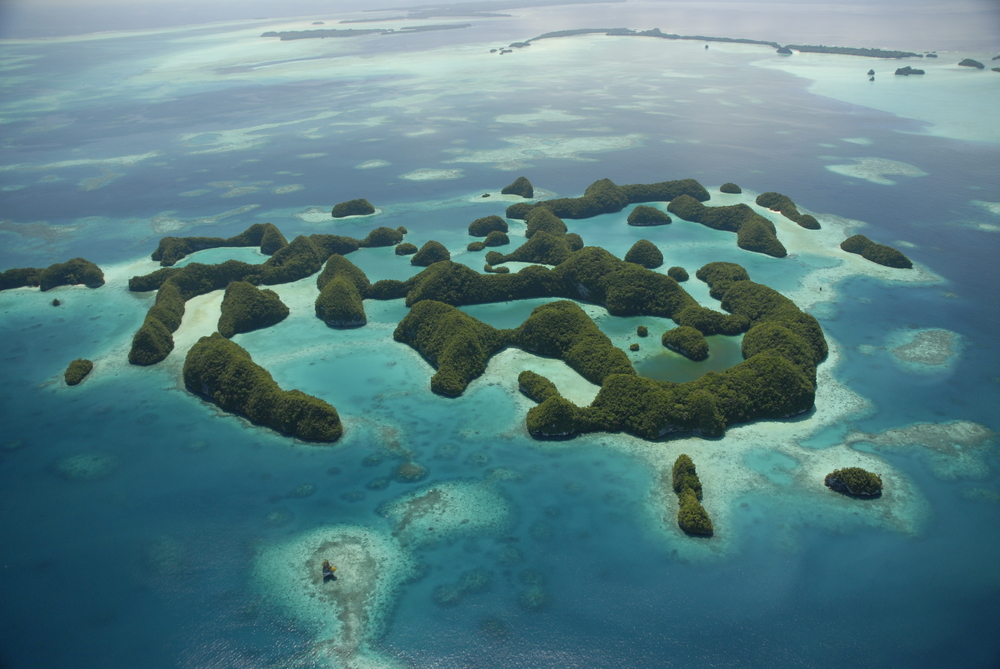 Aerial view of the islands and crystal clear blue waters that comprise Micronesia