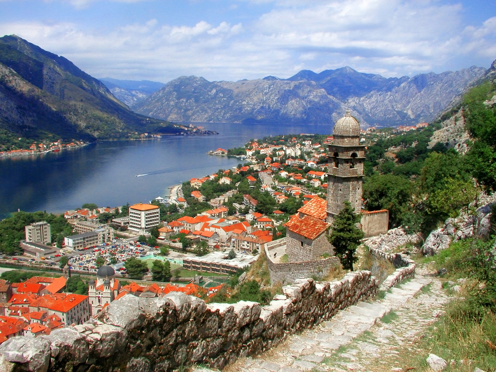 Kotor Bay winds through southwestern Montenegro with mountainous terrain in the backdrop